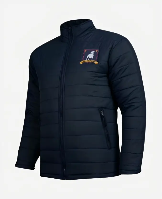 Jason Sudeikis Ted Lasso Blue Puffer Jacket Side Pose